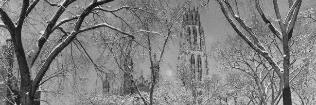 View of the top of Harkness Tower on a snowy day.