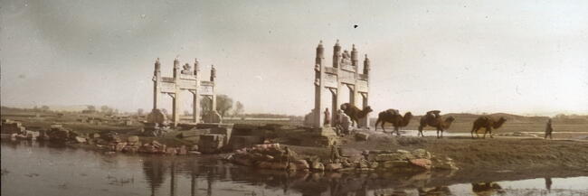 Camel Caravan Going Under Memorial Archways