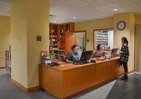 Photograph of the Gilmore Music Library circulation desk 