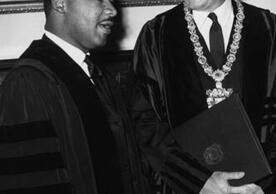 Dr. King in regalia with President Bewster 