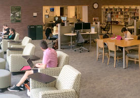 Marx Library Study Room West -- includes soft seating, large tables, power outlets, and public computers